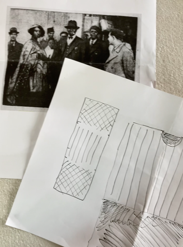 A paper with a drawing on it Description automatically generated